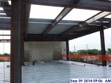 Started installing metal decking at the lower Roof Facing South (800x600).jpg